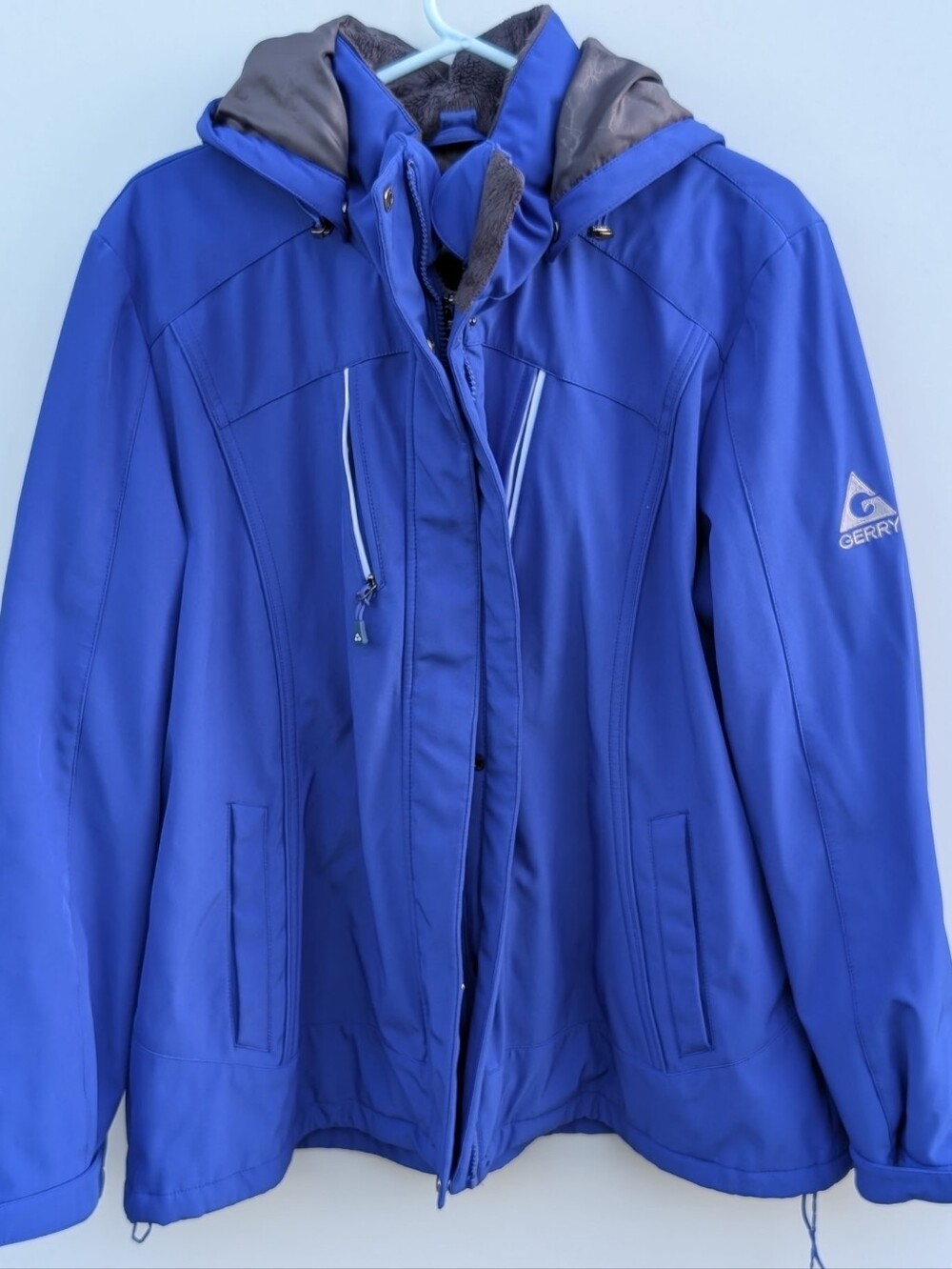 Gerry Systems women's 3-in-1 jacket with a detachable hood and front zip pockets